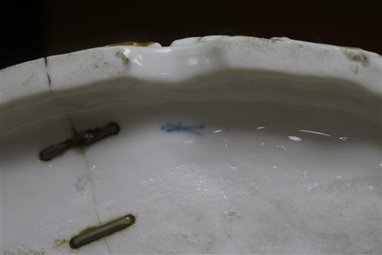 A German porcelain conversation group of three elegant figures and one other similar (cracked)	